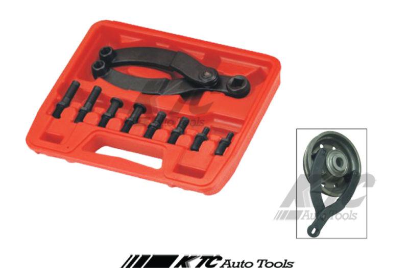 Universal camshaft pulley holding tool