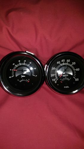 2 pc&gt;teleflex merk,gauge set,tac,65 mph speedo,trim &amp; fuel new.