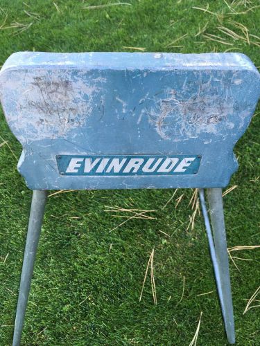 Vintage evinrude outboard motor stand antique