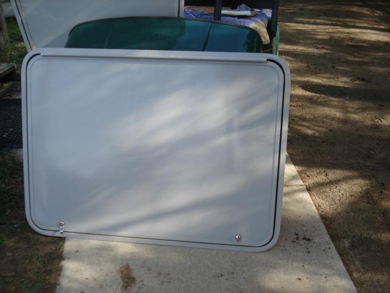 Trailer baggage door, clay color, 44" x 31", keys / locks / frame, etc. new, sin