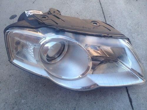 2006-2009    vw passat    oem    right headlight    12-523    c2