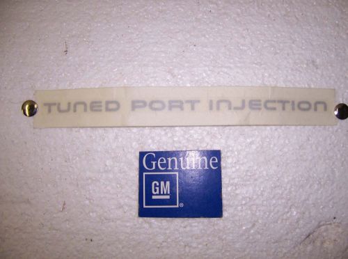 Tuned port injection decal rocker panel nos gm 1985 - 1990 camaro gm2000