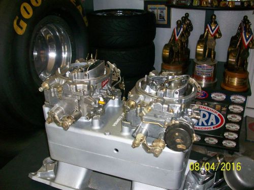 1 pair edelbrock (weber) 1406 tunnel ram carbs with electric choke/carbs only!!!