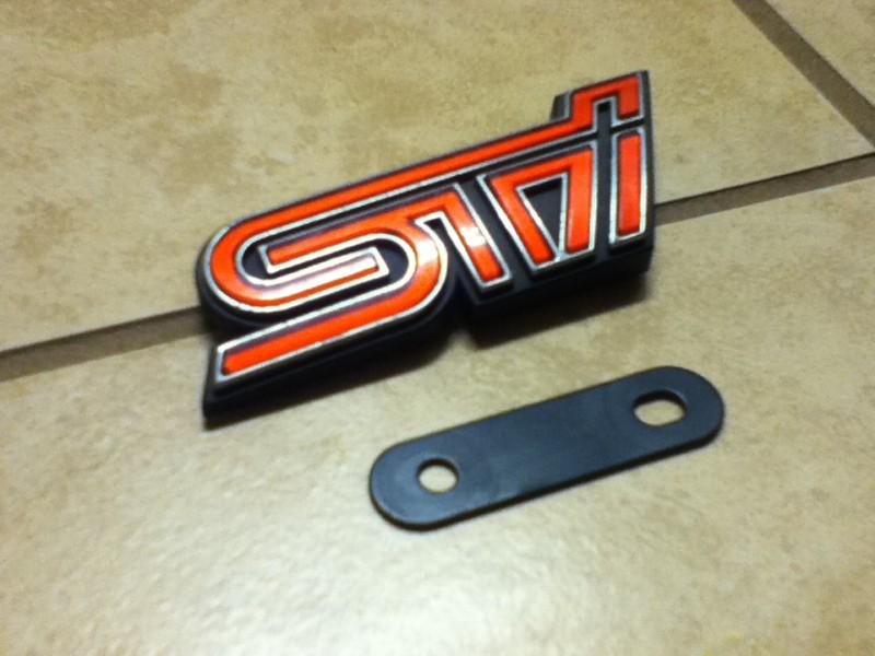 11-12 subaru wrx sti front grill emblem (sti) 
