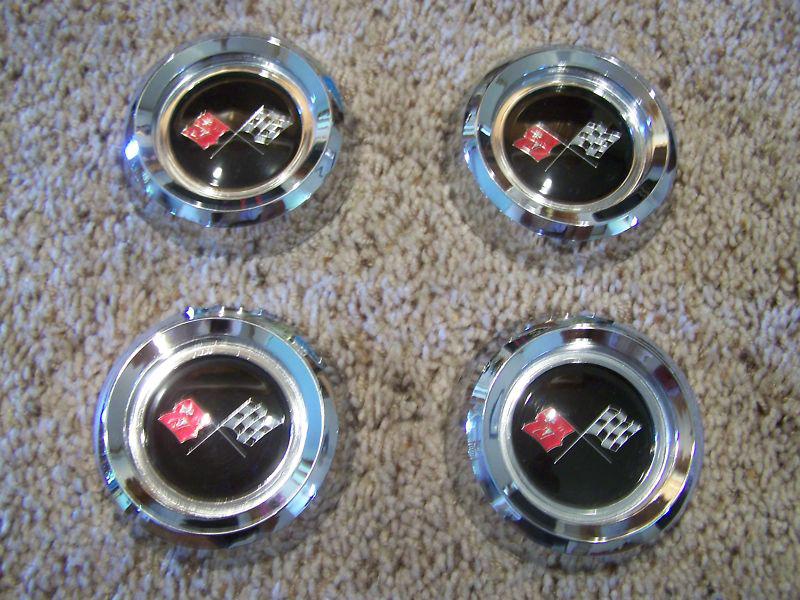 65-66 corvette-set of 4 hub cap ornaments-new?