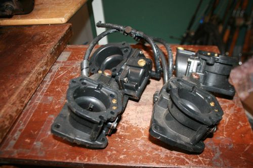 Used carburetors casting t# 398370 johnson evinrude  set of 4 v-4 looper