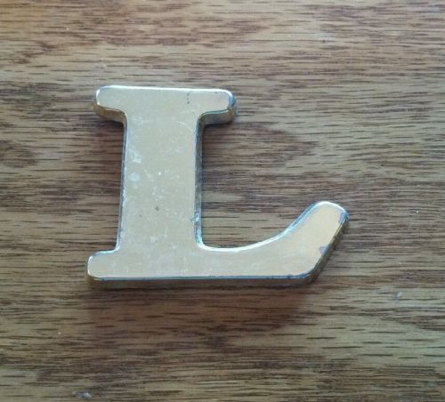 Crownline raised letter l gold logo decal letter
