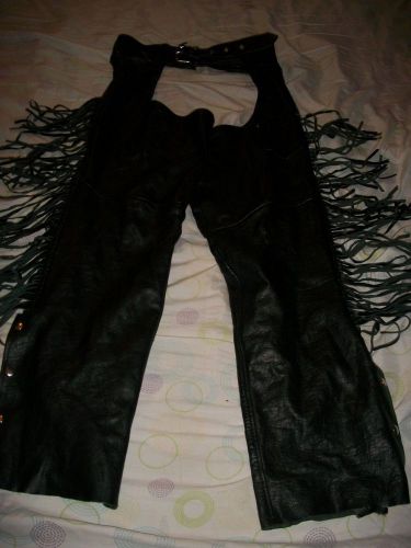 Heads leather riding chaps size 32to 36in waist 30 in length , with tassels