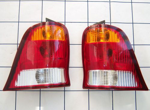 ! from 02 ford windstar se ~ oem part: tail lights both