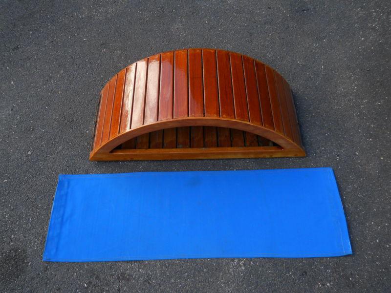 Custom sailboat helm seat with storage exotic woods look