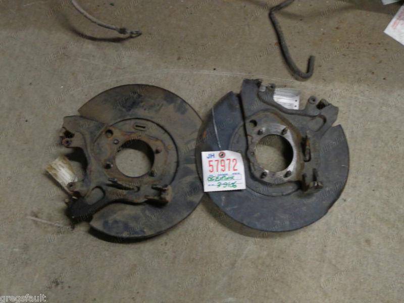 Sell 05 Explorer 8.8 Rear Disc Brake Backing Plates With Caliper