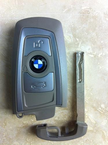  oem bmw 7 series smart key remote cut key (3-button) fcc: ygohuf5662 - nr! 