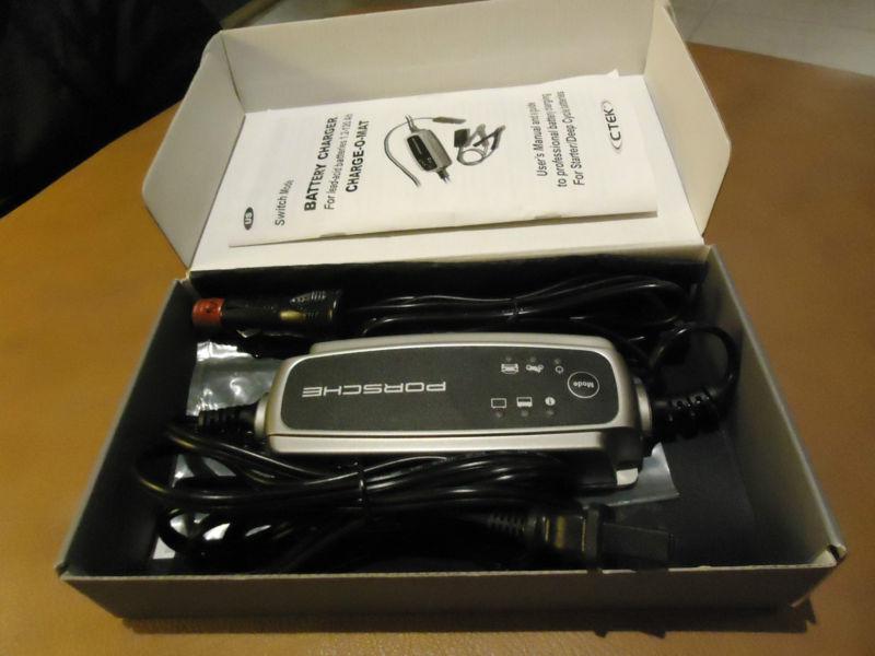 Porsche car battery slow charger oem new in box