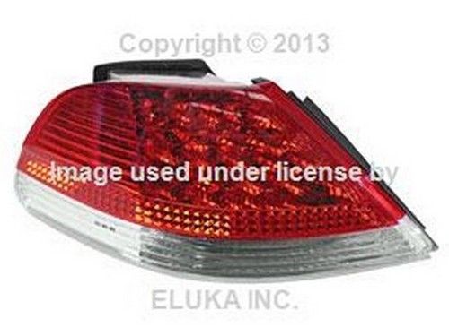 Bmw genuine taillight assembly with white turn signal for side panel rear left