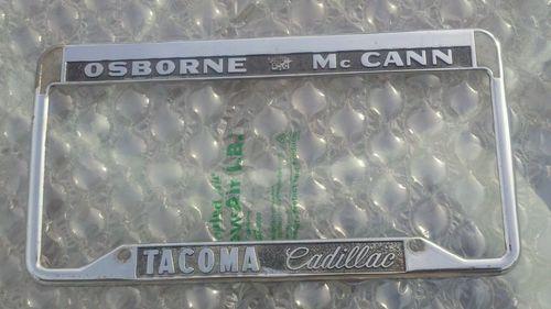 Licence plate frame osborne mc cann tacoma cadillac  