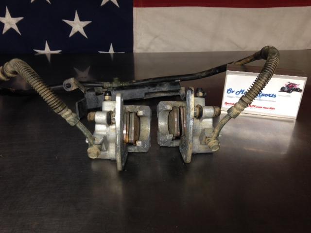 2001- 2005 yamaha raptor 660  front brake calipers,hoses and retainers good pads