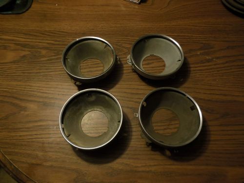 1965 65 gto tempest lemans oem headlight buckets and chrome trim