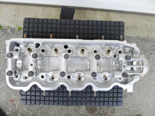 Mitsubish mirage cylinder head md125062, dodge colt '87-1990 oem new