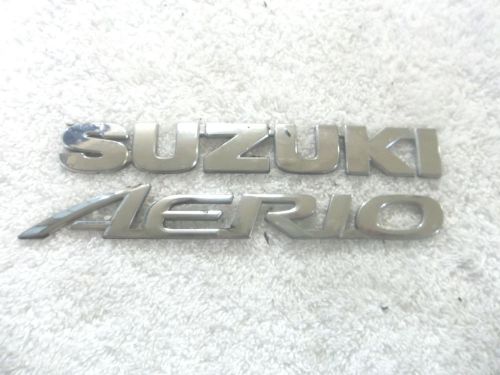 2003 suzuki aerio chrome trunk script ornament emblem