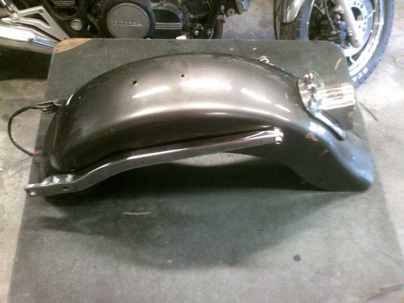 Used fl flh lowrider sportster or ironhead rear fender tombstone light ,struts 