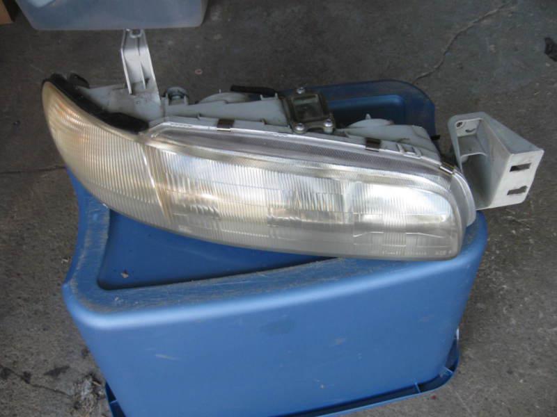Mazda 626 passenger right head light rh  1993-1997 original factory part