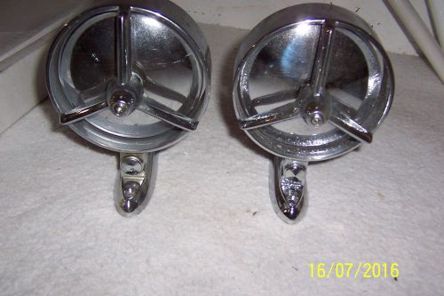 This set of (2) two 1958 buick side mirror #40100 yankee pacesetters
