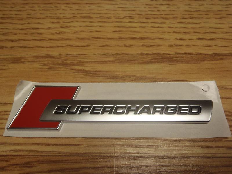 Audi supercharged emblem badge nameplate oem brand new 4f0853601a2zz 