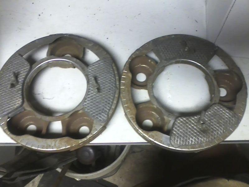 Pair of vintage hub-o-matic wheel balancers