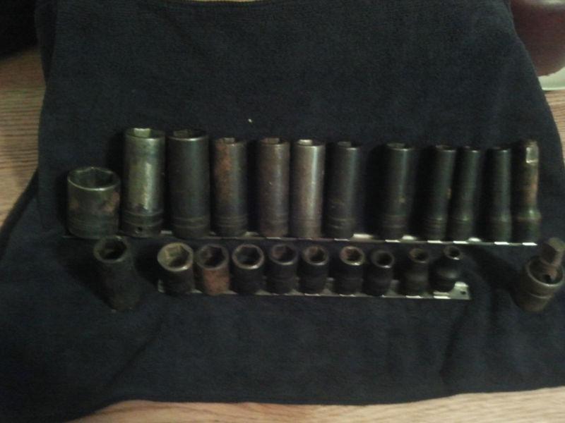 Huge snap-on tool socket lot -used (23 pieces+ the 2 holders seen)