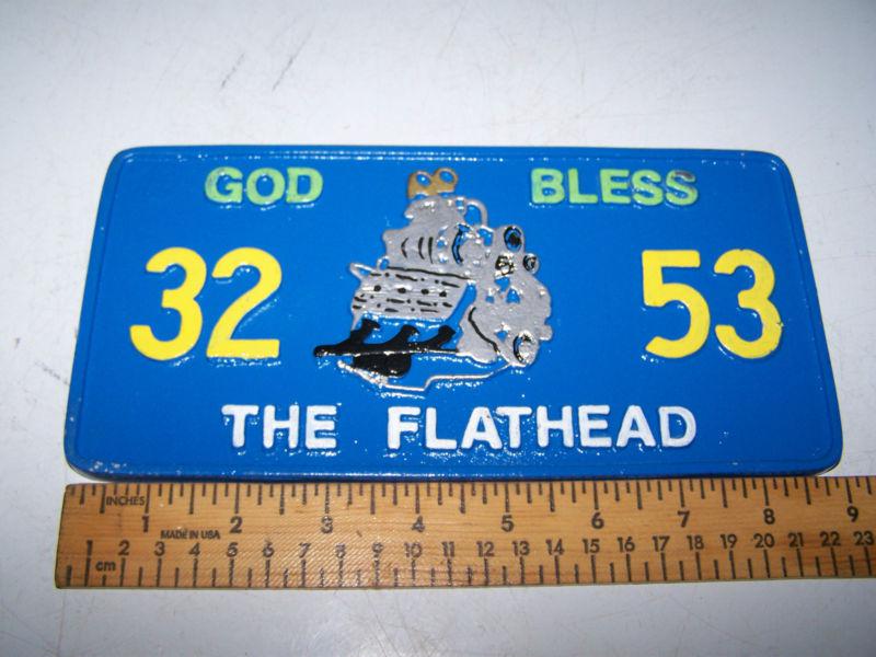 The flathead  car club plaque