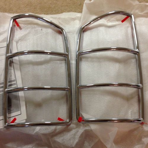 Oem taillamp guards chrome molded - 02-06 dodge ram mopar 82208795 nos