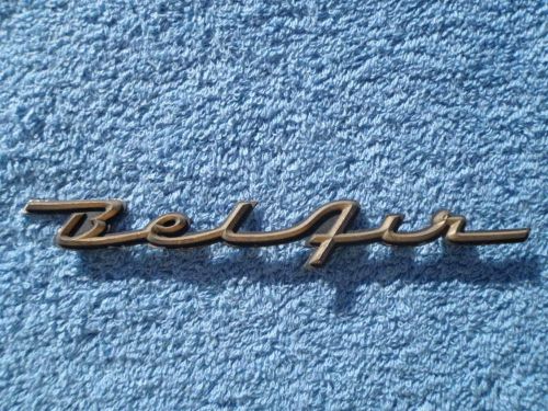 1957 chevy belair dash emblem script