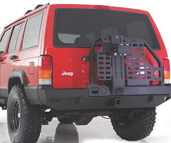 In box 84-2001 jeep cherokee black xj rear bumper with tire carrier &amp; hitch