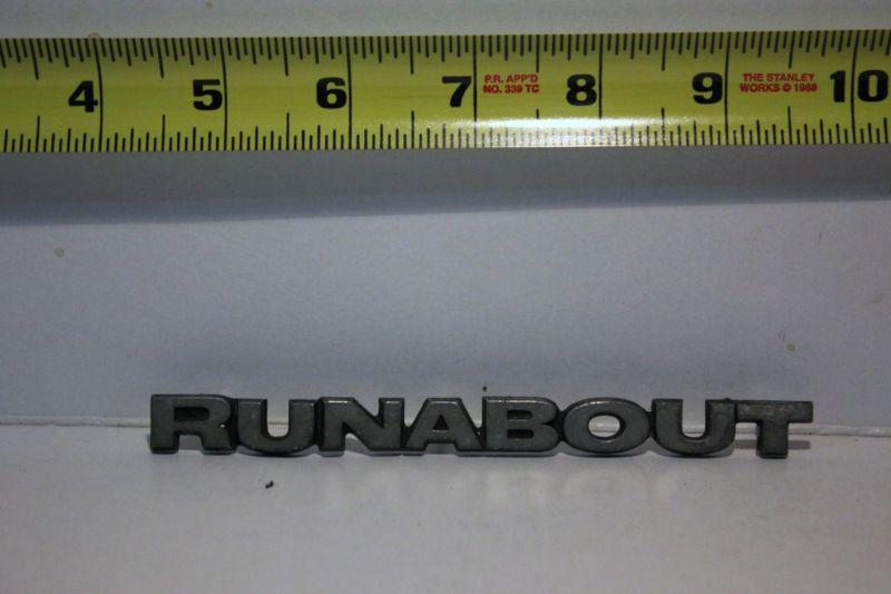 Old car emblem " runabout " removed from junked car many years ago