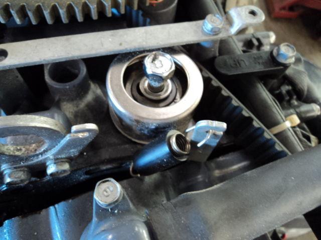 Tensioner assembly ~67f-11590-00-00~ yamaha f100 4-stroke 100 hp outboard motor