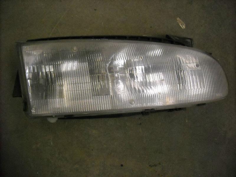 93 94 95 96 97 chevrolet prizm composite headlamp rh