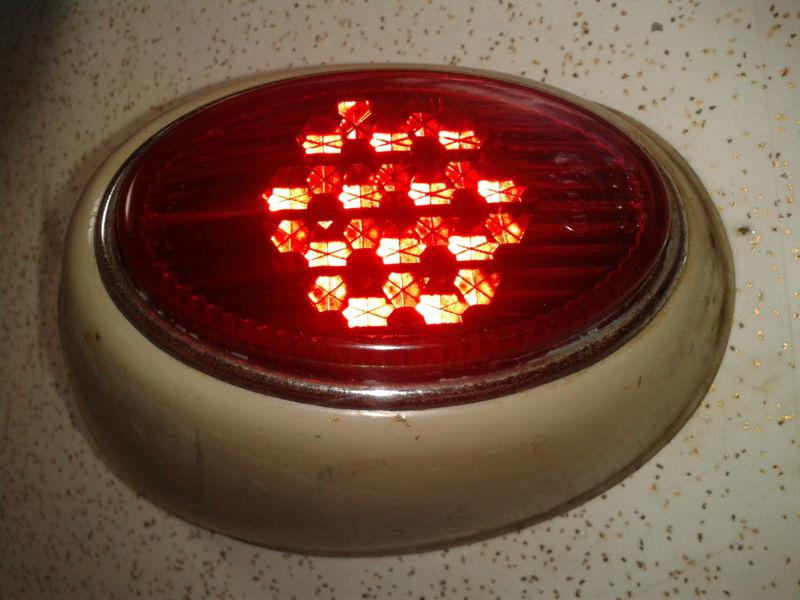 Vintage hella snowflake vw bug tail light & housing k1564 1950's 1960's ?