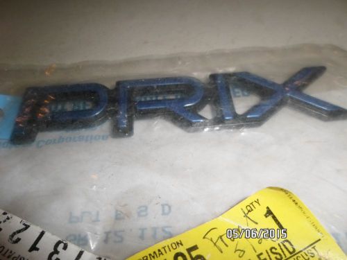 Nos gm 1994 pontiac grand prix front side door blue emblem  10254125