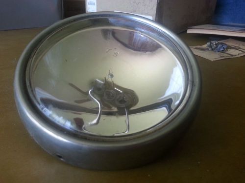 Vintage automobile/motorcycle headlight 4" round vg part# jun6-50l elec.?