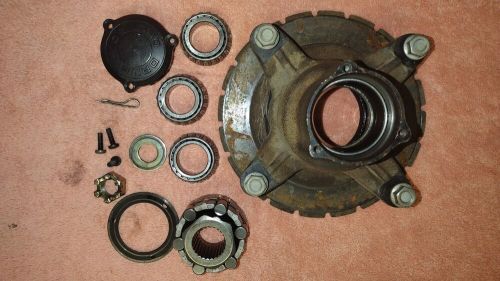 2000 polaris magnum 330 4x4 front hub and assembly pictured