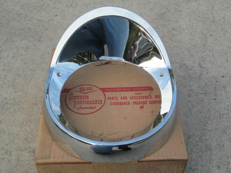 Nos 1956 1957 studebaker / packard headlight bezel.  #1312089w. original box ! 