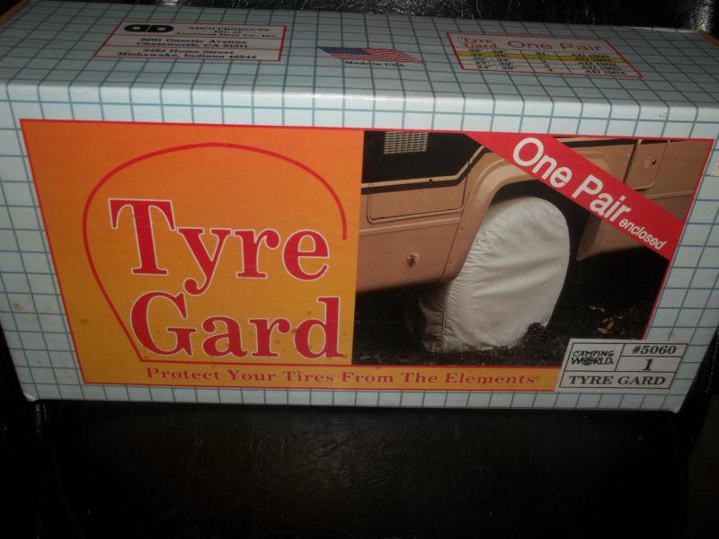 Pair of tyre gard tire protection 33"-35" camper tires 1 white nib