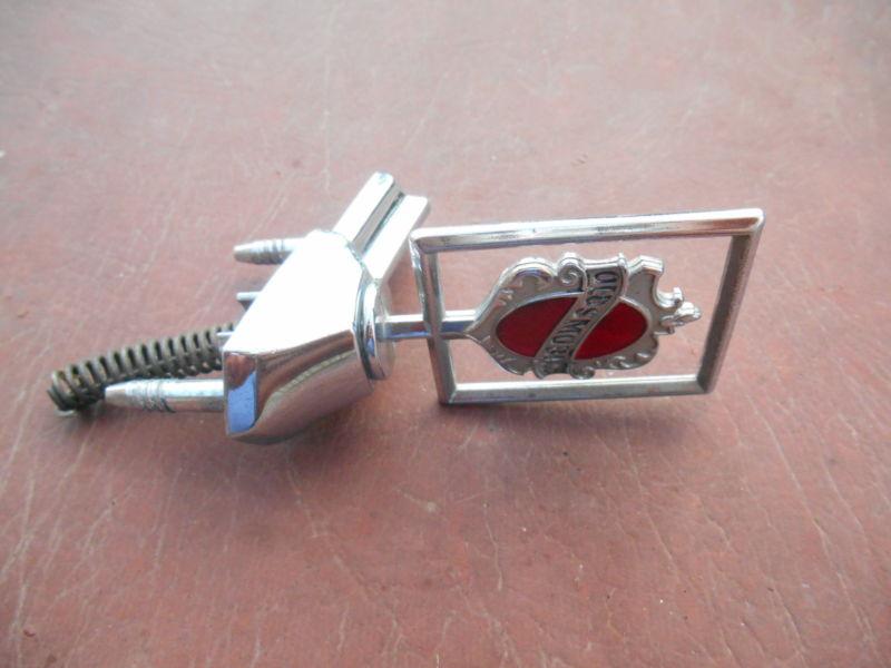 Oldsmobile ruby red chrome hood ornament w base  awesome shape