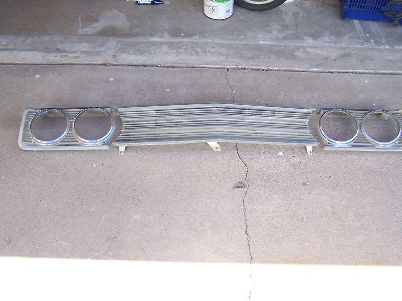 1969 ford ranchero / torino grill and headlight bezels - nice condition