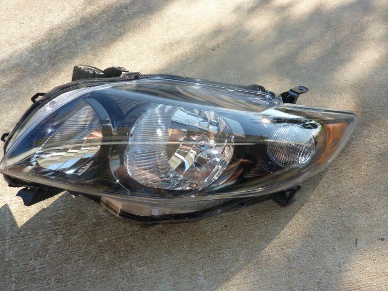****09 10 toyota corolla black trim  driver left headlight lamp original oem****