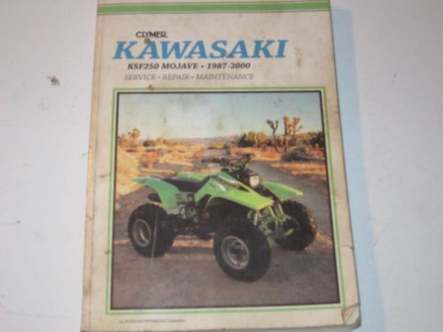Kawasaki mojave 250 side cover and other parts (inc shop manual)