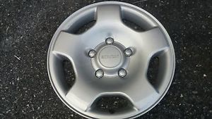 One used 15&#039;&#039; isuzu hombre 96-00 hubcap/wheel cover #56007