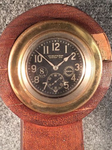 Waltham 8 day 15 jewels gimbal brass mount beveled lens antique auto clock 1910