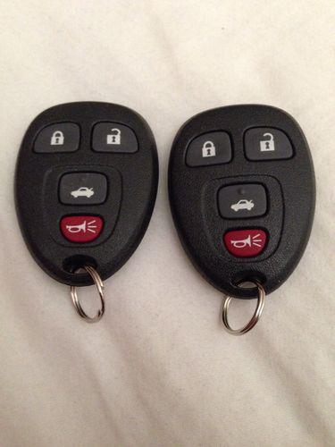 Two new gm 4 button keyless entry remote key fob genuine gm 15252034