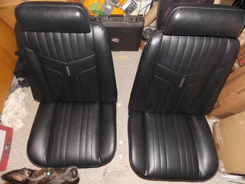 1969 gto/lemans black bucket seats recovered with original headrest